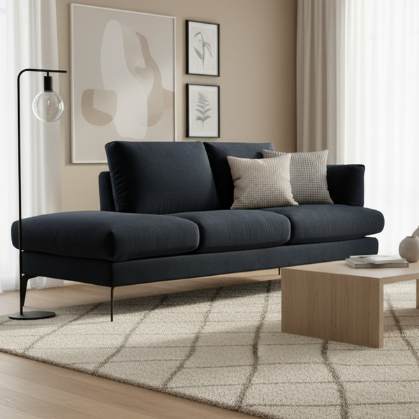 Chaise sofa in dark navy velvet upholstery, split back and seat cushions