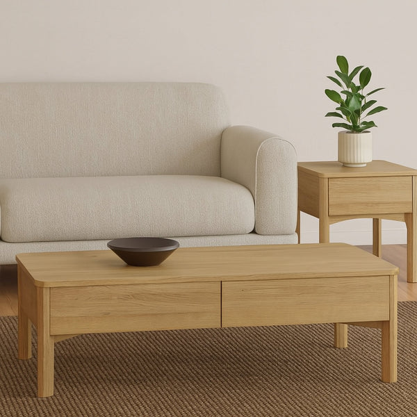 Light wood coffee table with two drawers and tapered legs