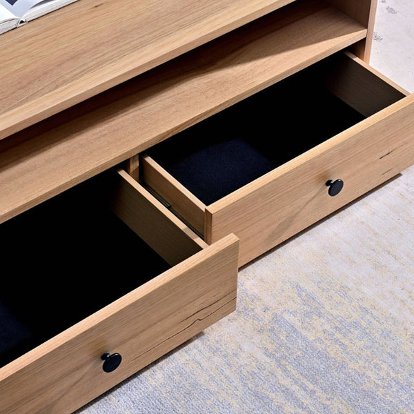 Light wood coffee table with pull-out drawer, open cubby, and black knob handles