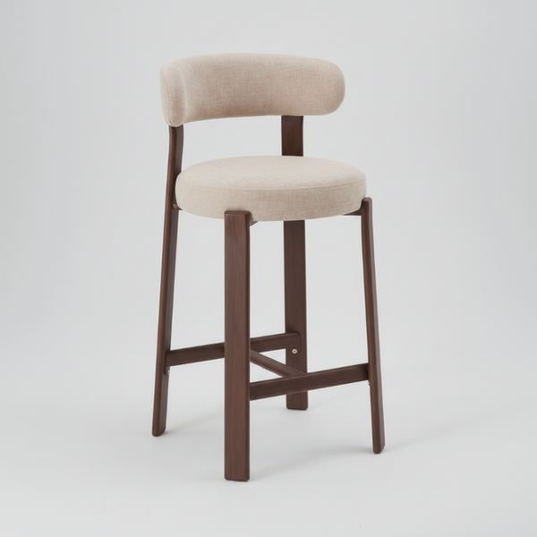 A modern bar stool with a light beige upholstered seat and curved backrest, supported by a dark brown wooden frame with four legs and front support bars, shown on a light gray background.