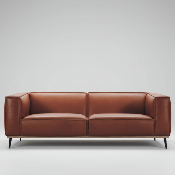 Brown leather two-seat sofa with rolled arms, split back cushions, and dark metal legs