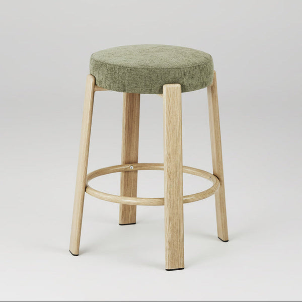 Bar stool with green cushioned seat and wooden legs on a white background