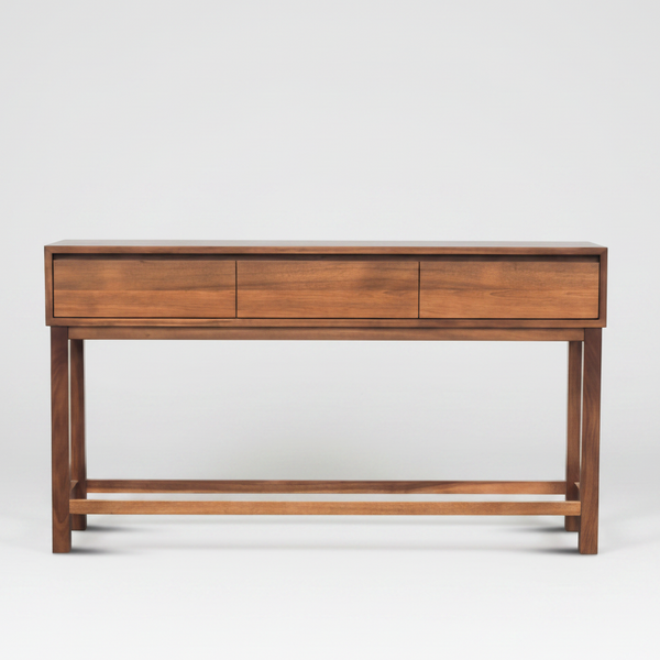Wood console table with a long drawer and three panel fronts, open lower shelf
