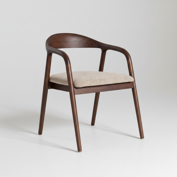 A mid-century modern wooden dining chair with a curved backrest, armrests, and a light beige upholstered seat cushion, shown on a light gray studio background.