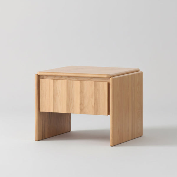 Light wood coffee table with drawer and angled legs