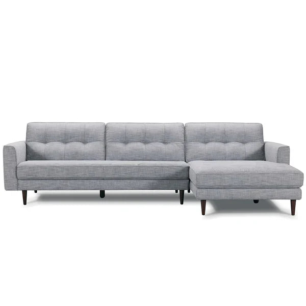 Light grey sectional sofa upholstery fabric with chaise, tufted back and seat cushions