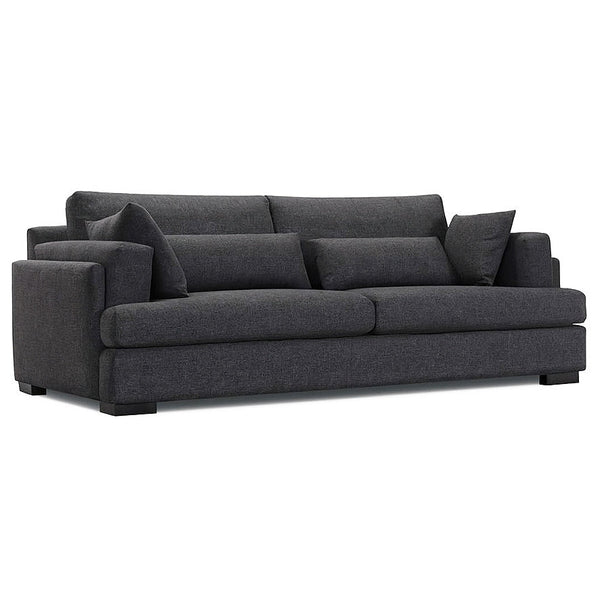 Dark grey fabric sofa with padded arms, three back cushions, and chaise seat
