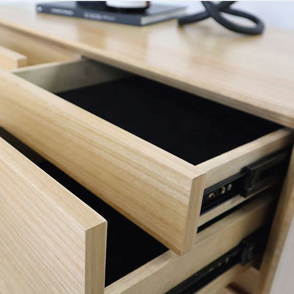 Wood bed frame with open storage drawer and black pull-out tray