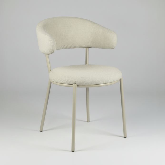 A modern dining chair with a curved, cushioned backrest and a round seat, upholstered in a light beige textured fabric with a slim, matching metal frame and legs, shown against a plain white background.
