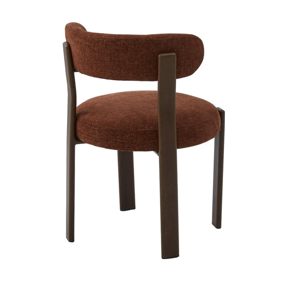 Upholstered dining chair with rounded back, rust-brown cushion and walnut legs