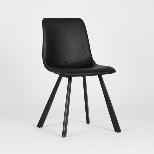 Black upholstered dining chair with rounded backrest, cushioned seat, and black legs