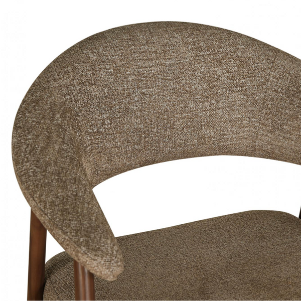 Close-up of a chair upholstered in a textured taupe-brown woven fabric, showing the curved backrest and part of the seat, with dark wooden legs visible against a white background.