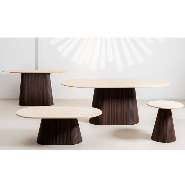 Round dining table and side tables with dark ribbed pedestal bases