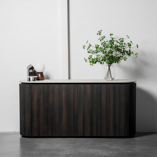 Modern dark wood console table with a white top against a plain wall.