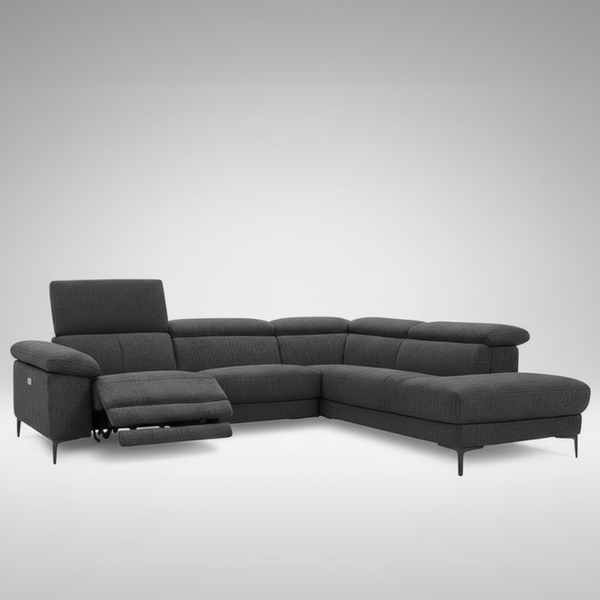 Dark grey fabric corner chaise sofa side view with recliner footrest and tapered feet