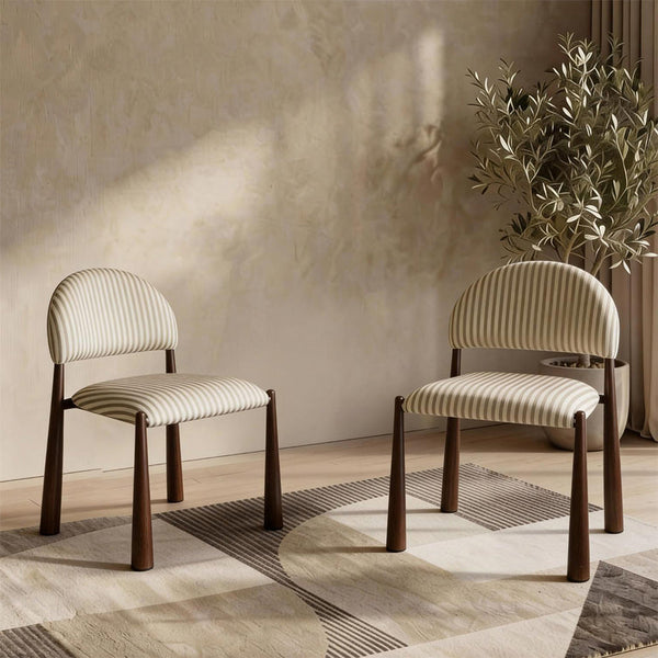Set of two dining chairs with walnut frames and beige striped upholstered backs and seats