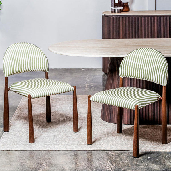 Walnut dining chair with moss green striped cushion seat and curved backrest