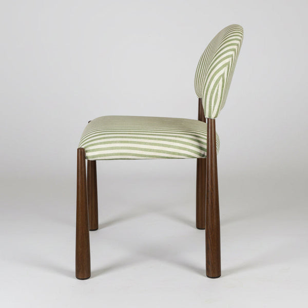 Walnut dining chair with moss green striped upholstered seat and curved back