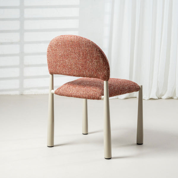 Fabric dining chair with curved back and seat, red-brown upholstery and white legs