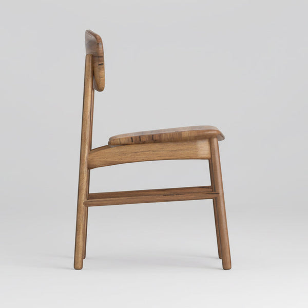 Wood dining chair side view with vertical legs and rounded armrest