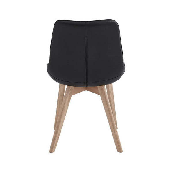 Black dining chair with smooth PU back, center seam, and light wood legs