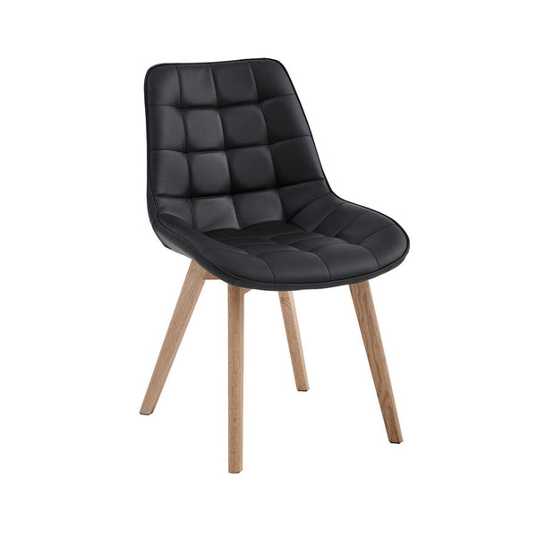 Black dining chair with quilted PU upholstery, arched back, and tapered wood legs