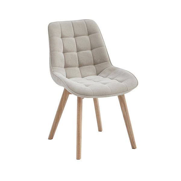 Taupe upholstered dining chair with quilted back, curved arms, and natural wood legs