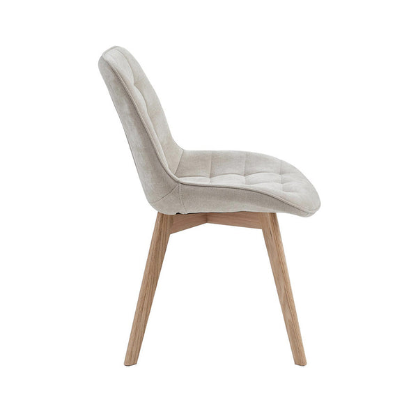 Taupe fabric dining chair with wing back, padded seat, and natural wood legs