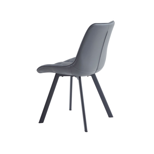 Dark grey dining chair with quilted back and seat, armless style, black tapered legs.