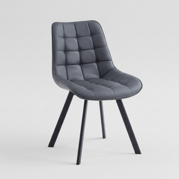 Dark grey dining chair with quilted seat and back panels and black tapered legs.