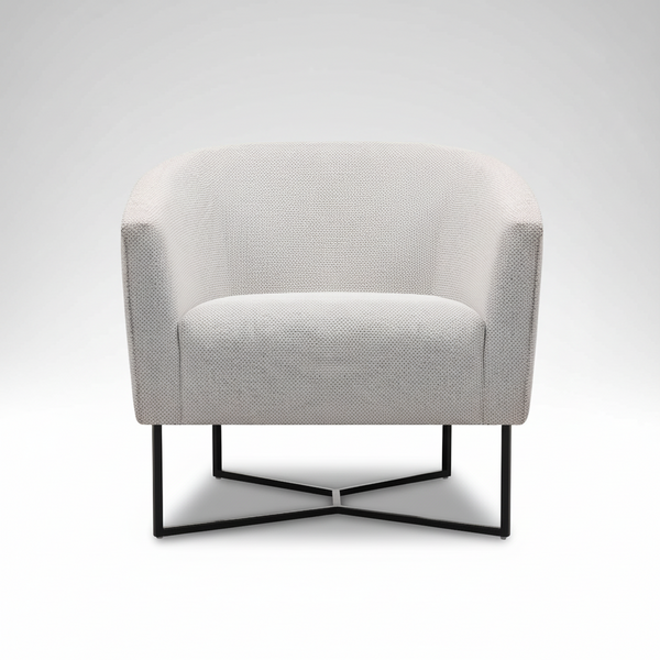 Accent chair with light beige upholstered seat and rounded arms, black metal base