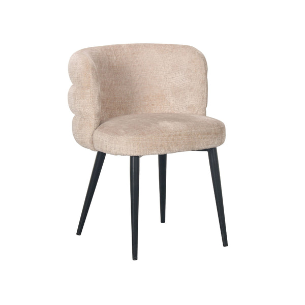 Light beige fabric dining chair with barrel-shaped back, armrests, and black legs