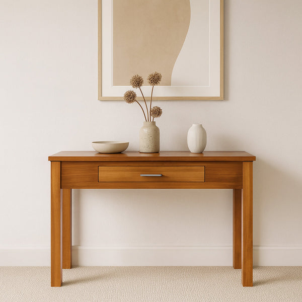 Havana console table in warm wood with single center drawer and metal pull