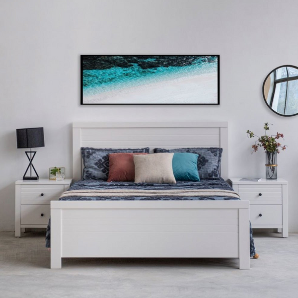 White wooden bed frame with slatted headboard and two drawers along the front