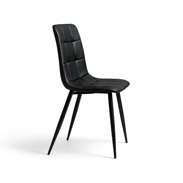Black dining chair, side view, padded seat and tufted square back, slim angled legs