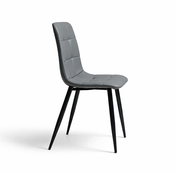 Charcoal dining chair side view with quilted seat, curved back, and black legs