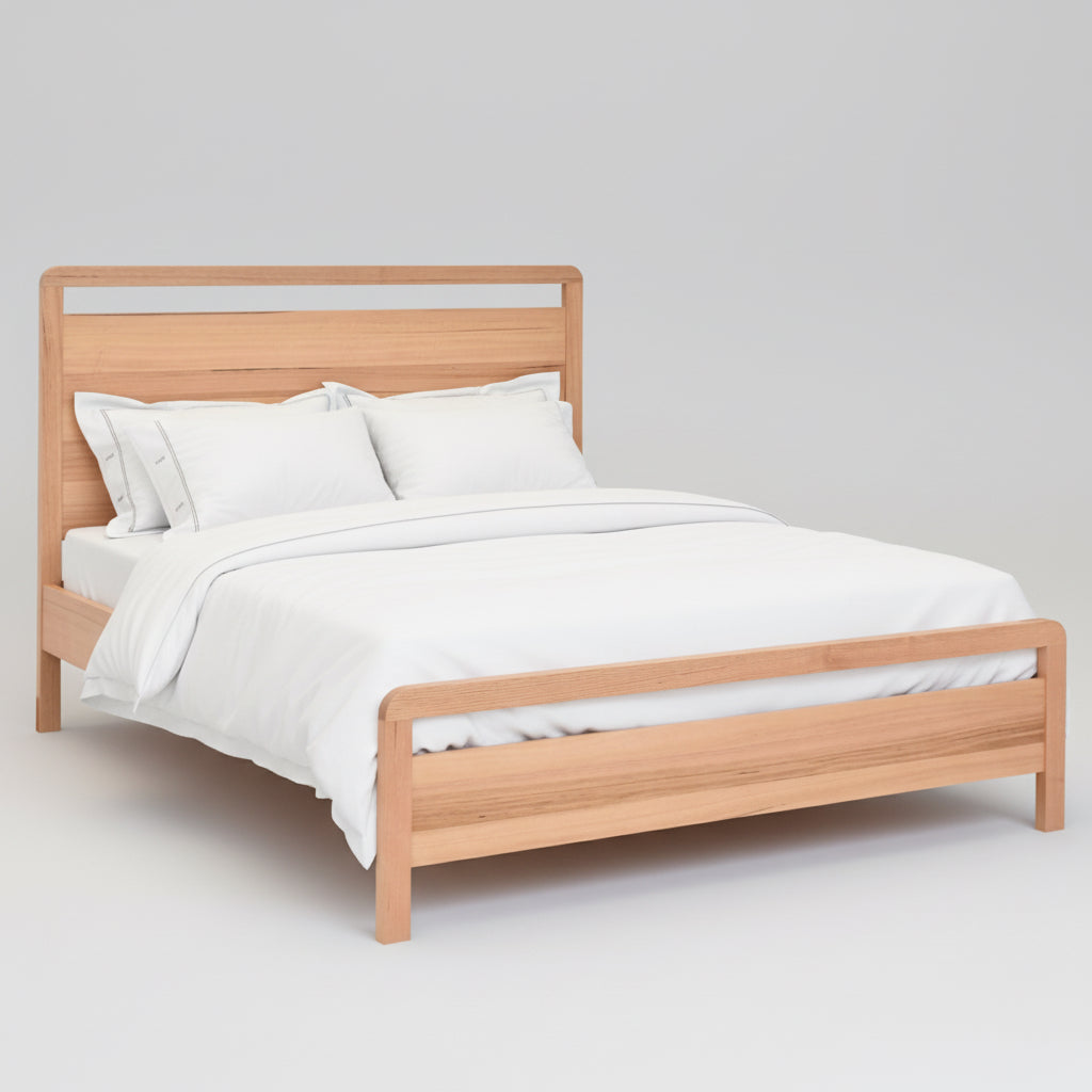 Light wood bed frame with slatted headboard and wide footboard panel