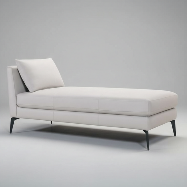 White fabric chaise lounger with black legs and one back pillow