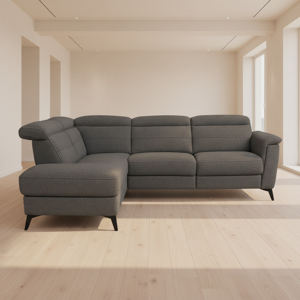 Dark gray upholstered corner terminal chaise with deep seats, plush cushions, and armrest