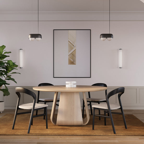 Round natural oak dining table with pedestal base