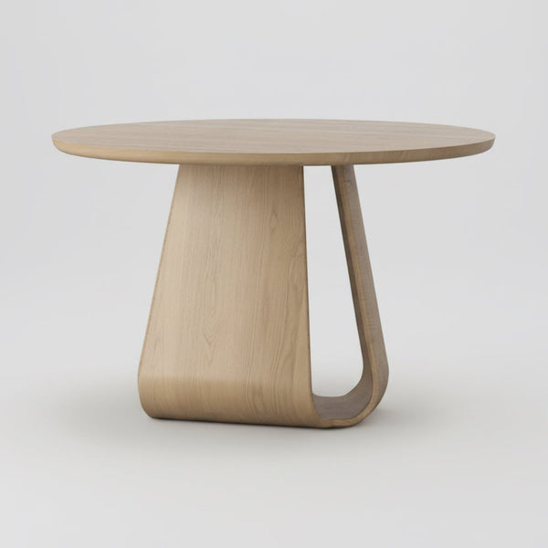 Round natural oak dining table with curved pedestal base
