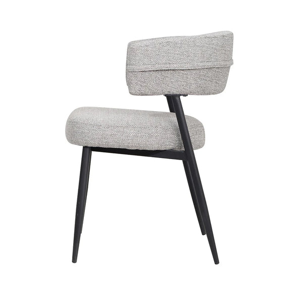 Gray upholstered dining chair with rounded back and black legs