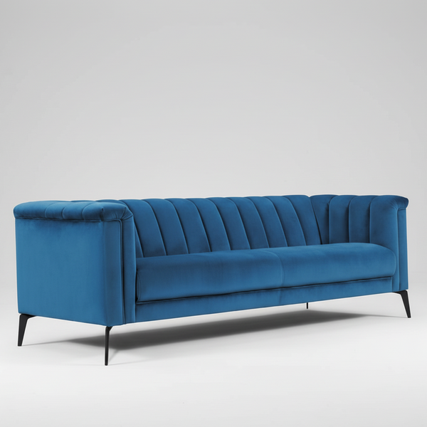 Teal blue velvet sofa with tufted back and rounded arms