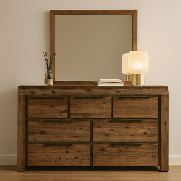 Wooden dresser with eight drawers and a matching wall mirror