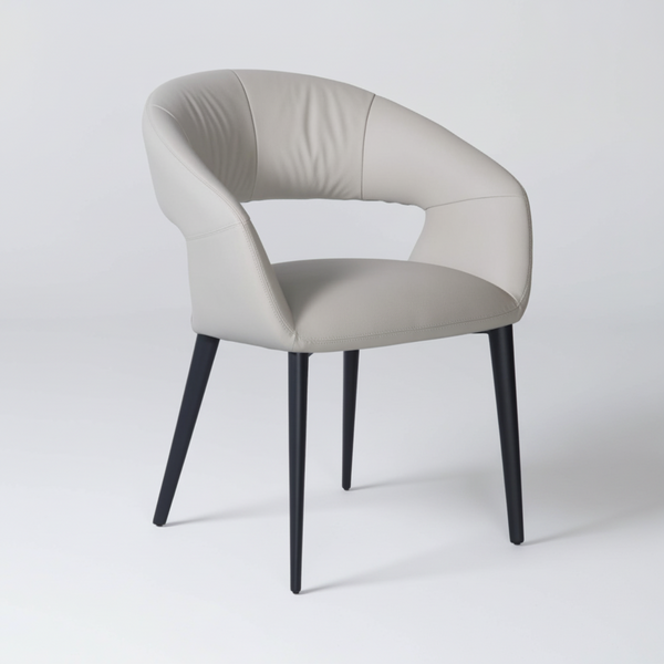 Light beige barrel-back dining chair with padded seat and dark wooden legs
