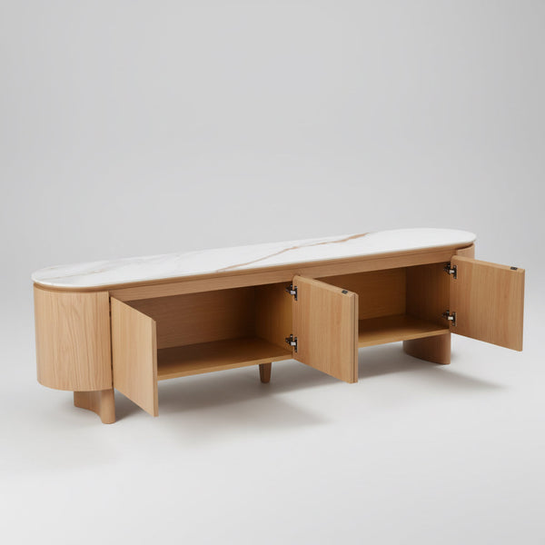 Light oak TV unit with open hinged compartments and rounded top, tapered legs