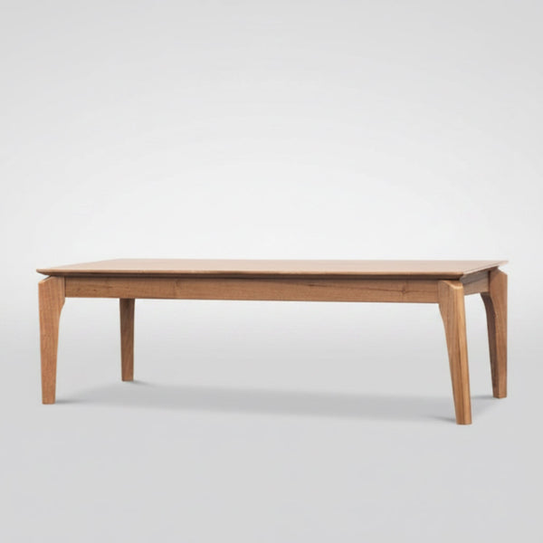 Wooden dining table on a white background