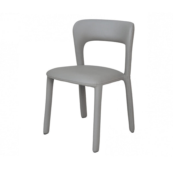 Grey dining chair with cushioned seat, rounded backrest, and four slim legs.