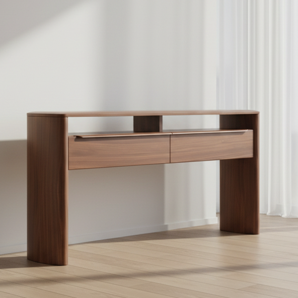 A modern wooden console table with two drawers and open shelving, shown in a minimalist room with light wood floors and white curtains.