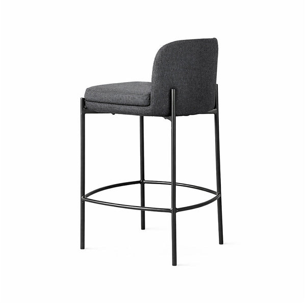 Charcoal upholstered bar stool with tall backrest, padded seat, and round footrest